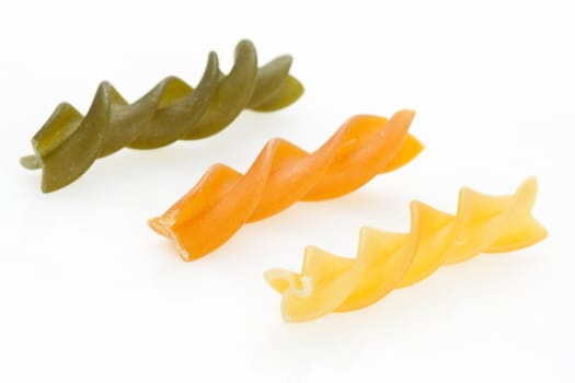 Multicolored pasta with the addition of natural tomatoes and spinach