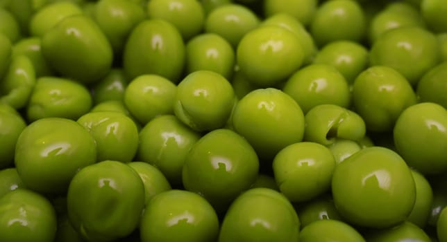 Background of green canned peas.