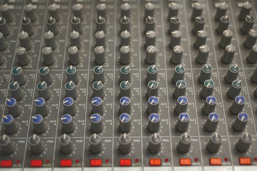 close up shot of an sound mixer buttons