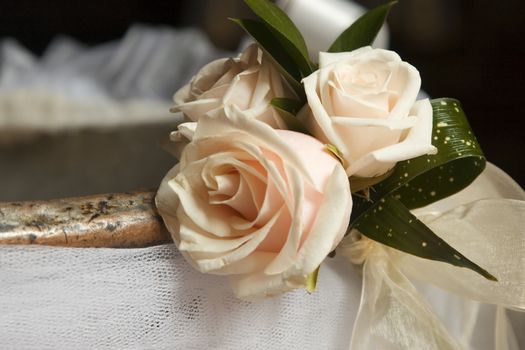 detail of blossom pink roses from ceremony bouquet