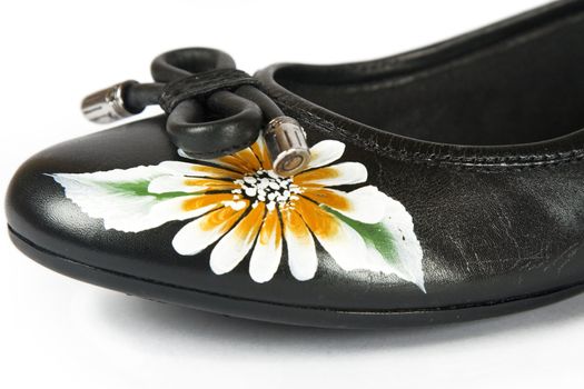 black women shoes with printed flower on white background