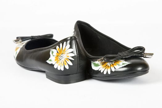 black women shoes with printed flower on white background
