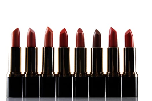 different red lipstick isolated on white background 