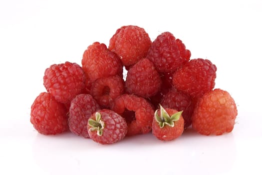 front view of ripe raspberry on white background 