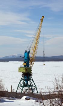 special crane boom. North Port in the winter. A bright sunny day