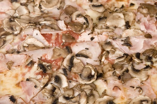 Delicious italian pizza with mushrooms and ham