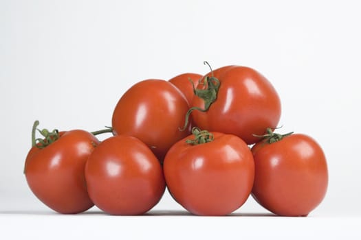 Fresh tomatoes on the white isolated background, Studio photo 