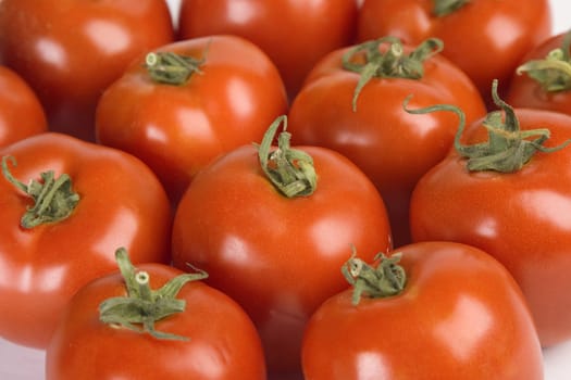 Fresh tomatoes on the white isolated background, Studio photo 