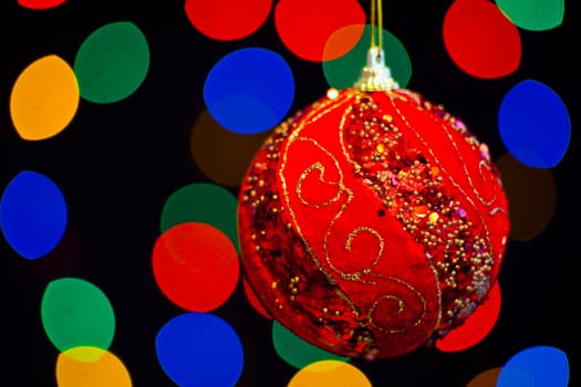 Red Christmas ball with lots of colors light