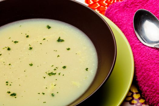 A creamy vegetable soup with parsley