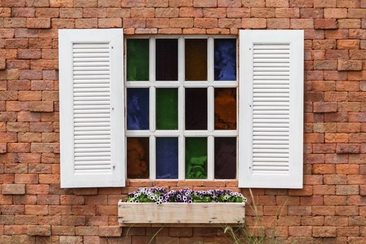 white retro window on the red brick wall