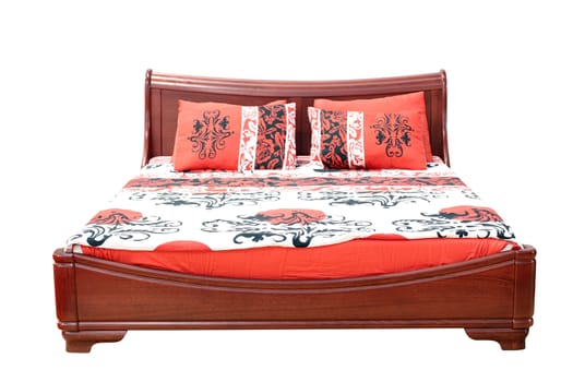 wooden bed with colorful linen