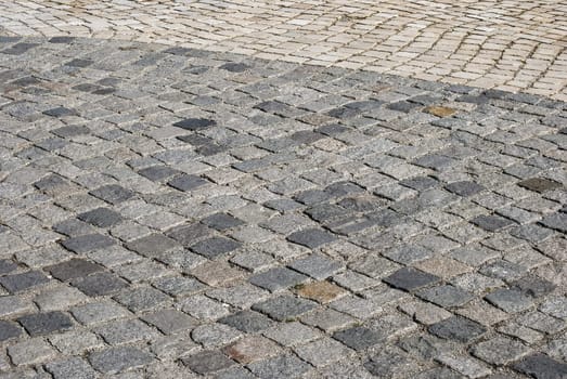 Stone paved park alley closeup as background