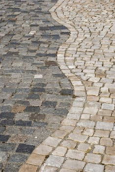 Stone paved park alley closeup as background