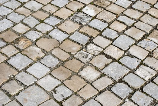 Stone paved park alley closeup as background