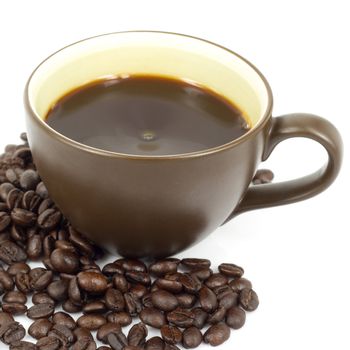 cup of hot coffee and coffee beans in white background