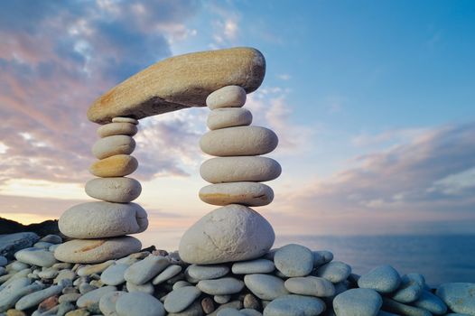 Stack of zen stones on a sky background