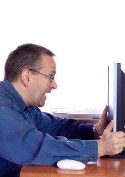 Surprised man in front of his computer