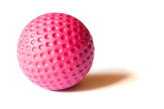 Red colored Mini Golf ball on an isolated background