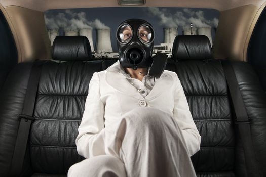 Lady in a gas mask on the back seat of limousine