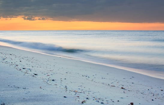 sunrise over sea with sky