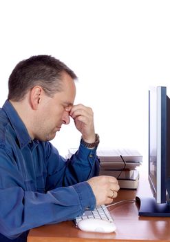 Tired man in front of his computer