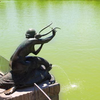 Madrid Sirena con Lira statue of mermaid in Retiro park lake