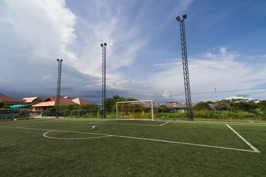 soccer football pitch with green artificial grass