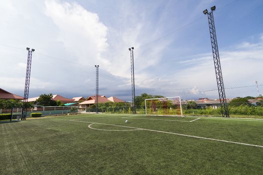 soccer football pitch with green artificial grass