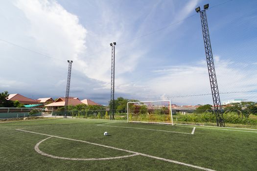 soccer football pitch with green artificial grass