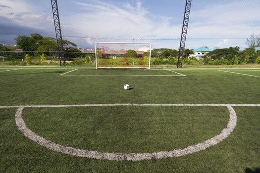 soccer football pitch with green artificial grass