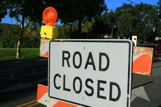 Road closed road sign close up.
