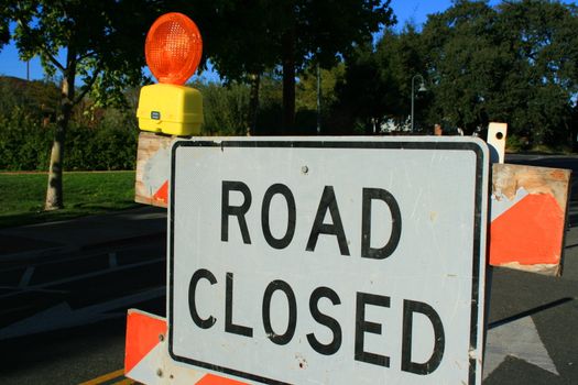 Road closed road sign close up.
