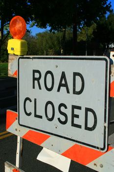 Road closed road sign close up.
