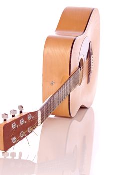 Acoustic guitar on white background