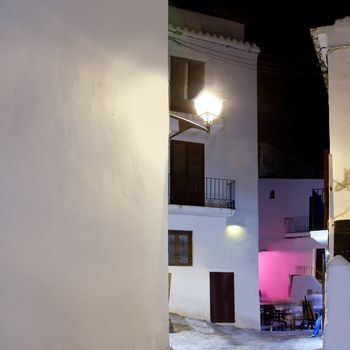 Ibiza island white houses in the night at Eivissa town