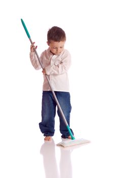 Little boy with a broom
