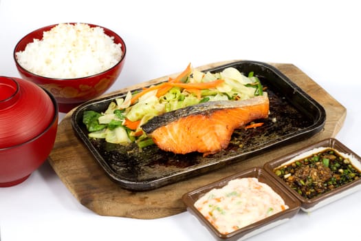 Japanese food style , salmon fish grilled the plate on white background
