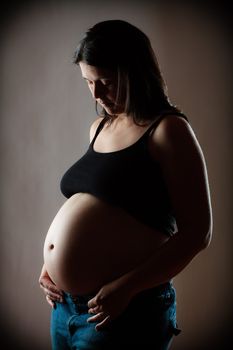 Pregnant woman in studio