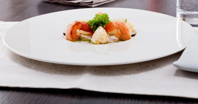 fresh tasty grilled shrimps with potato and kohlrabi puree vegetarian food