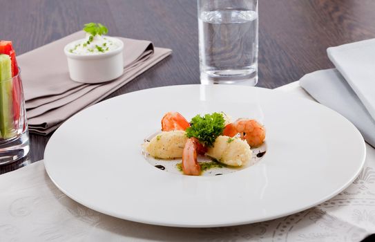 fresh tasty grilled shrimps with potato and kohlrabi puree vegetarian food