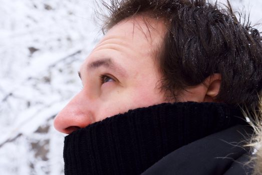 portrait of a man in a winter forest