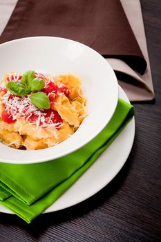 tasty fresh homemade ravioli with tomato sauce basil and parmesan