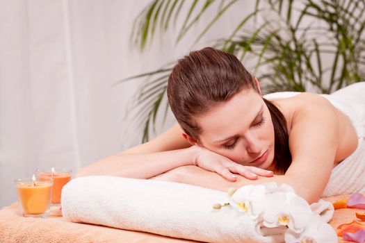 young attractive smilig woman doing wellness spa relaxing massage