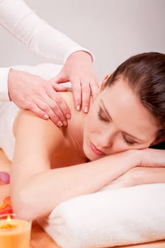 young attractive smilig woman doing wellness spa relaxing massage