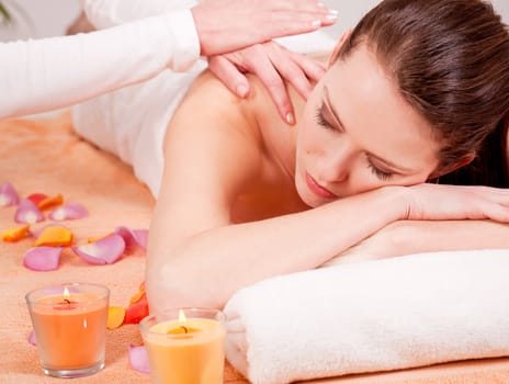 young attractive smilig woman doing wellness spa relaxing massage