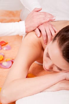 young attractive smilig woman doing wellness spa relaxing massage