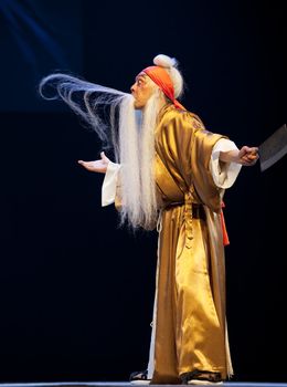 CHENGDU - JUN 5: chinese Sichuan opera performer make a show on stage to compete for awards in 25th Chinese Drama Plum Blossom Award competition at Chongzhou theater.Jun 5, 2011 in Chengdu, China.
Chinese Drama Plum Blossom Award is the highest theatrical award in China.