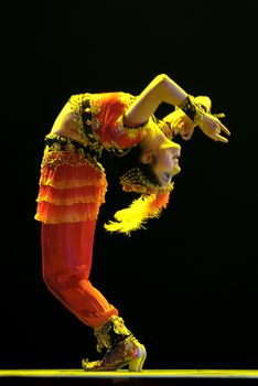 CHENGDU - DEC 10: Chinese Uighur dancer performs folk dance onstage at JINCHENG theater.Dec 10,2007 in Chengdu, China.
Choreographer: Jia Suer Tursun, actor: Guliminuo Mai Maiti