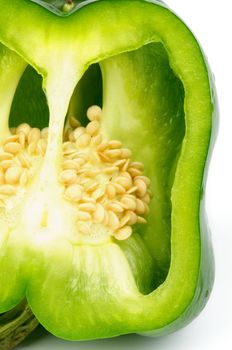 Cut into Half Green Bell Pepper  and Seeds closeup 